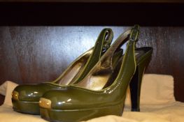 A pair of Miu Miu Ladies brown shoes, size 37.