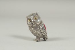 A silver owl pin cushion, 3cm.