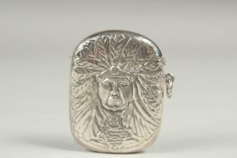 A silver Indian chief vesta.