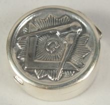 A Sterling silver circular Masonic pill box, 2.5cm.