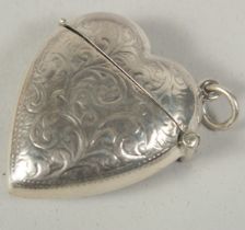 A Sterling silver heart shaped vesta case, 4cm.