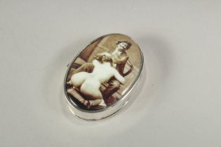 A small silver oval pill box, the lid with an enamel of an artist and nude, 3.5cm.