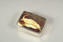 A silver and enamel 'nude' pill box.
