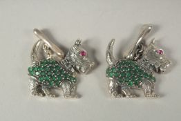 A pair of silver Scotty dog cufflinks in a box.