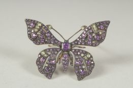 A good 9ct. gold, amethyst, peridot and diamond butterfly brooch in a box.