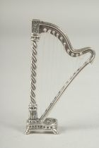 A miniature silver harp, 5.5cm.