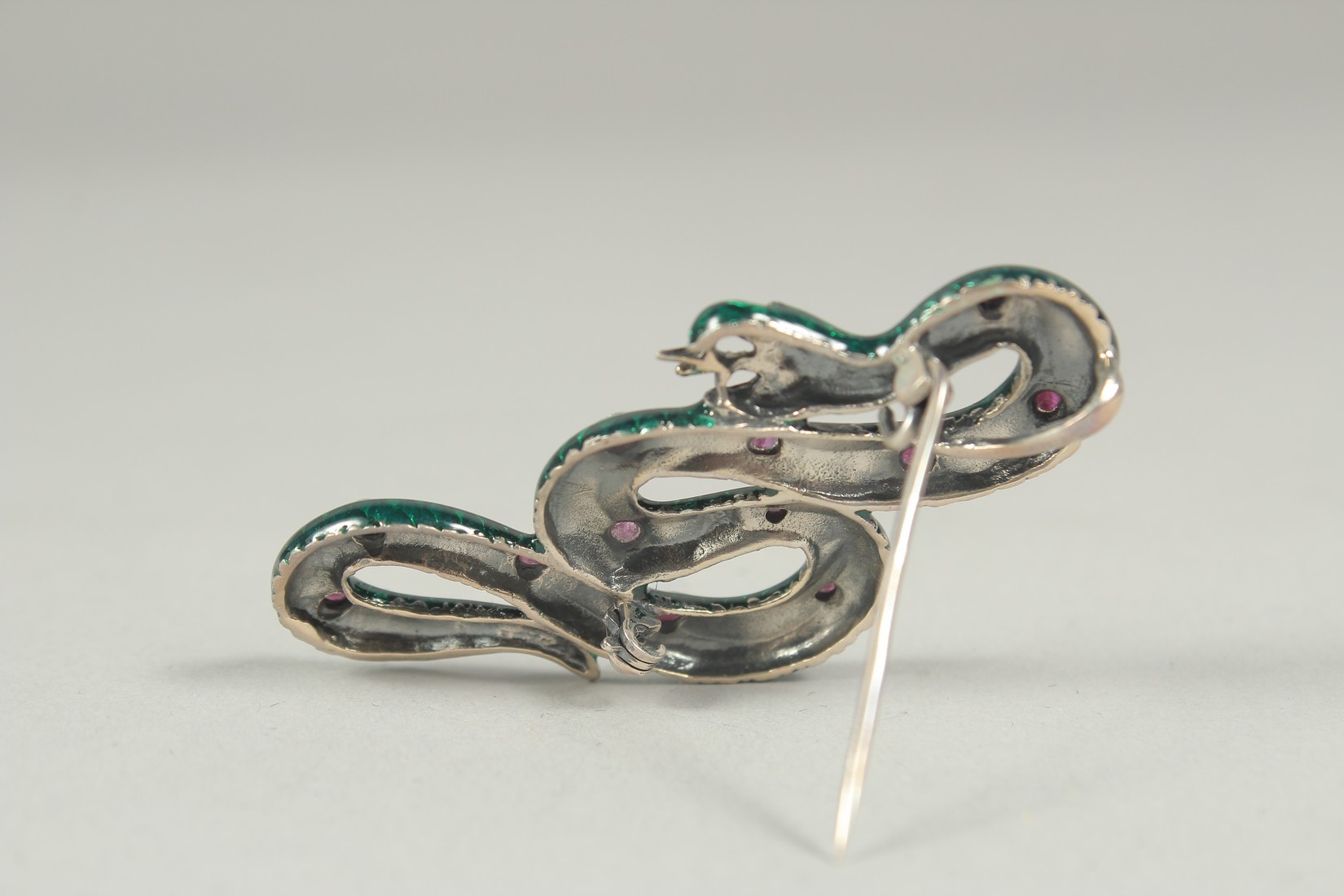 A silver ruby and enamel snake brooch or pendant in a box. - Image 2 of 2