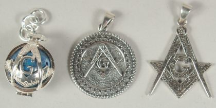 Three various silver Masonic fobs.