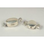 Two silver novelty sweet pill boxes.