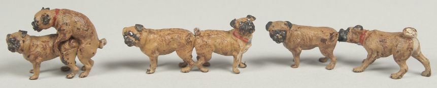 A set of 3 cold painted bronze mating pug dogs.