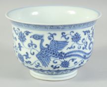 A CHINESE BLUE AND WHITE PORCELAIN BOWL, with phoenix and lotus decoration, the base with six-