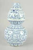 A CHINESE BLUE AND WHITE PORCELAIN DOUBLE GOURD VASE, 32cm high.