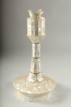 AN INDIAN GOA MOTHER OF PEARL CANDLESTICK, 32cm high.