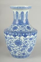 A LARGE CHINESE BLUE AND WHITE PORCELAIN LOTUS VASE, 34cm high.