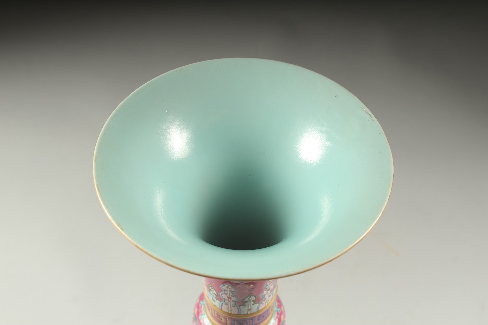 A CHINESE PINK GROUND FAMILLE ROSE PORCELAIN SECTIONAL GU VASE, and fitted hardwood stand, bearing - Image 9 of 10