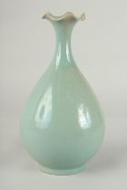 A CHINESE CELADON GLAZE PORCELAIN VASE, with stylised petal-formed rim, 27cm high.