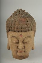 AN ARCHAIC WOOD GUANYIN HEAD, 22cm high.