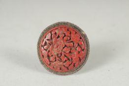 A SMALL CHINESE CINNABAR LACQUER BROOCH.