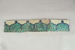 A COLLECTION OF THREE LATE 16TH - EARLY 17TH CENTURY IZNIK STYLE OTTOMAN DAMASCUS BORDER TILES,