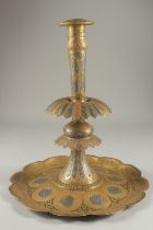 A LARGE 19TH CENTURY PERSIAN QAJAR SILVER INLAID ENAMELLED BRASS CANDLESTICK, 39cm high.