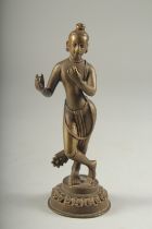 A FINE 17TH - 18TH CENTURY TIBETAN OR NEPALESE BRONZE FIGURE of fluting Krishna, 15.5cm high.