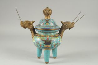 A FINE CHINESE BLUE GROUND CLOISONNE TRIPOD CENSER AND COVER, with twin dragon-head brass handles