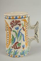 A RARE 18TH CENTURY IZNIK STYLE ITALIAN MAJOLICA TANKARD, 20cm high.