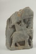 A RARE GANDHARA CARVED GREY SCHIST TILE FRAGMENT, depicting an elephant and rider, 19.5cm x 13cm.