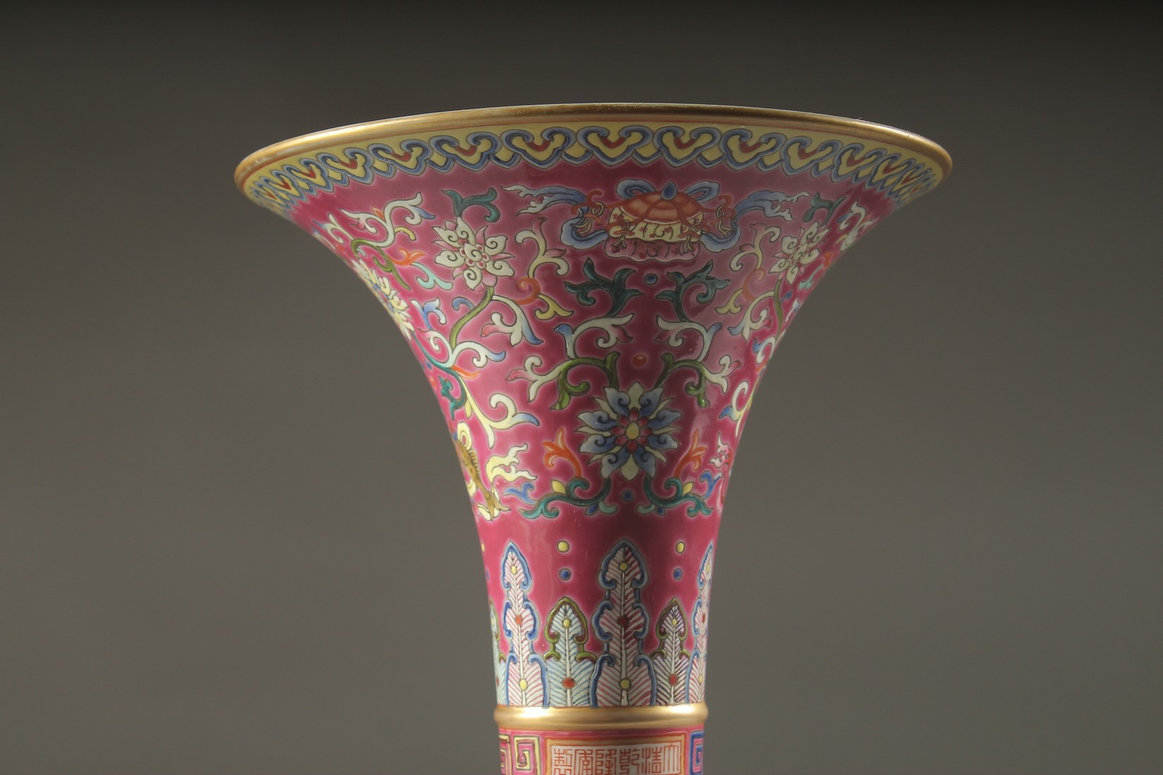 A CHINESE PINK GROUND FAMILLE ROSE PORCELAIN SECTIONAL GU VASE, and fitted hardwood stand, bearing - Image 4 of 10