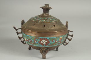 A CHINESE CHAMPLEVE ENAMEL CLOISONNE CENSER AND COVER, raised on tripod legs, 15cm high.