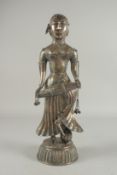 A LARGE LATE 19TH CENTURY SILVER OVERLAID FIGURE OF A MUSICIAN, holding a drum wearing jewellery and