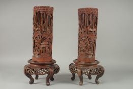 A LARGE PAIR OF 19TH CENTURY CHINESE CARVED BAMBOO VASES, together with carved and pierced