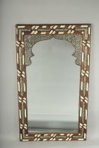 A MOROCCAN BONE INLAID AND METAL MOUNTED WOOD FRAMED MIRROR, 100cm x 58cm.