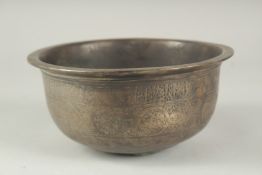 A FINE 12TH-13TH CENTURY PERSIAN SELJUK BRONZE BOWL, with calligraphic decoration and mythological