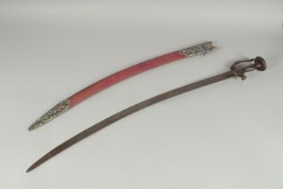 A 19TH CENTURY INDIAN TULWAR SWORD AND SCABBARD, the associated scabbard with silver chape and