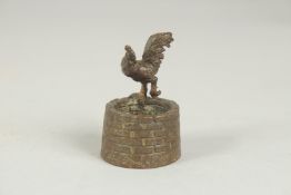 A JAPANESE BRONZE OKIMONO OF CHICKEN, stood upon a well with a toad inside, inscribed to bottom edge