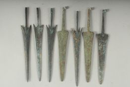 A COLLECTION OF EIGHT BRONZE ARROWS, possibly Persian Luristan, (8).