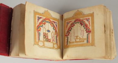 A 19TH CENTURY MOROCCAN LEATHER BOUND DALA'IL AL KHAYRAT, with images of Mecca and Madina with