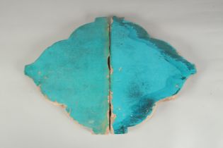 TWO LARGE 17TH -18TH CENTURY MUGHAL INDIAN TURQUOISE GLAZED TILES, each 39cm x 27.5cm.