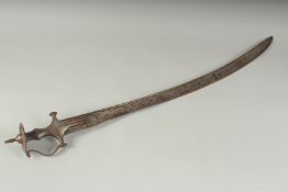 A FINE 18TH CENTURY SOUTH INDIAN TULWAR SWORD, the blade with engraved Hindu deities, 93cm overall.
