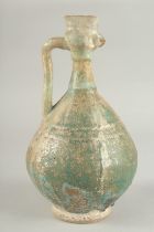 A RARE 12TH-13TH CENTURY PERSIAN KASHAN TURQUOISE GLAZED COCKEREL HEAD EWER, 28cm high.