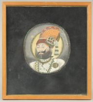 A FINE 19TH CENTURY INDIAN MINIATURE PAINITNG depicting the Maharaja of Bundi, framed and glazed,