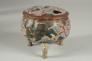 A CLOISONNE TRIPOD CENSER AND COVER, decorated with foo dogs and stylised clouds, 10cm high.