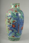 A LARGE CHINESE BLUE AND WHITE PORCELAIN VASE WITH LATER FAMILLE ROSE DECORATION, the blue and white
