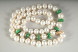 A STRING OF 53 PEARLS AND 7 JADE PIECES.