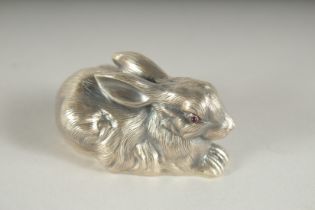 A RUSSIAN SILVER RABBIT. Mark: head 88., Faberge & I P. 2.75ins long.