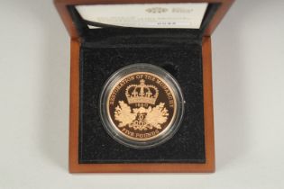THE 2010 UK RESTORATION OF THE MONARCHY, £5.00 GOLD PROOF COIN. No. 0088. Boxed.