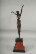 AFTER D. H. CHIPARUS. A BRONZE DANCER, 14ins high. Signed, on a marble base.