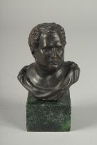 A BRONZE ROMAN MAN on a marble base.