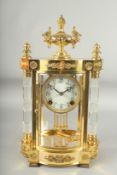 A GOOD LOUIS XVIthSTYLE GILT METAL SERPENTINE SHAPED FOUR GLASS CLOCK with cut glass columns and urn